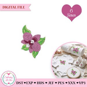 May include: Digital file of a purple and green floral embroidery design. The design is shown on a white baby onesie, blanket, socks, and embroidery hoop. The image includes the text "6 Sizes" and "Embroidery Art Store".