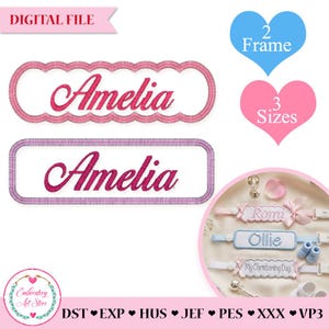 May include: Digital embroidery file featuring two name designs with the name "Amelia" in a script font. One design has a scalloped border, the other a rectangular border. Includes heart-shaped graphics with text "2 Frame" and "3 Sizes".