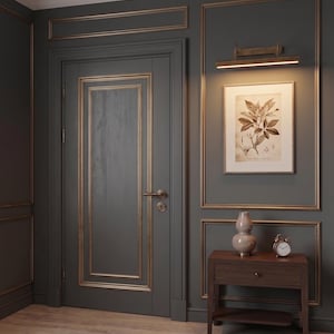 Handmade antique brass painting light featuring adjustable arms and warm ambient glow.