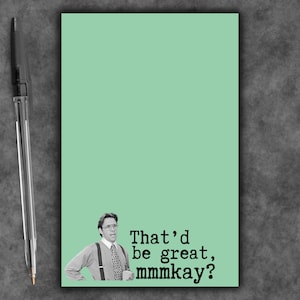 May include: A rectangular mint green notepad featuring a black and white illustration of a man in a dress shirt, tie, and suspenders at the bottom left. The text "That'd be great, mmmkay?" is printed in black typewriter font next to the illustration.