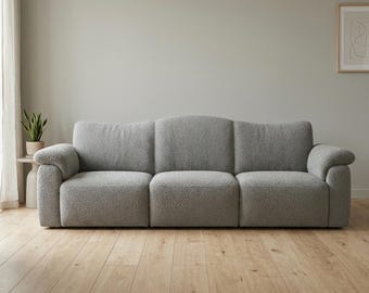 Canapé 3 places texturé gris clair transitionnel avec dossier incurvé