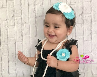 Conjunto para niña con temática de pastel: mono de encaje negro y diadema con flores color aguamarina