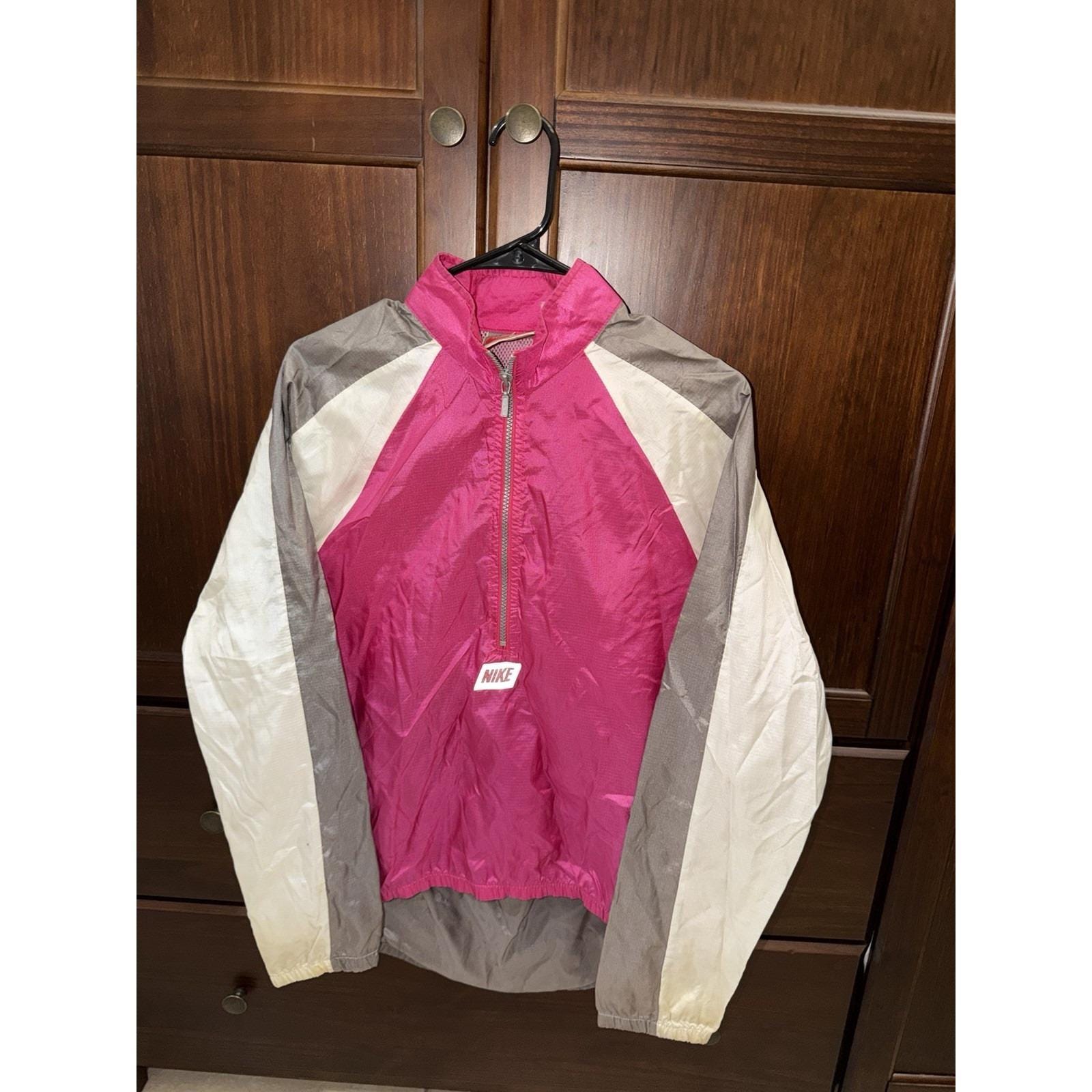 pink and white nike jacket