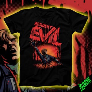 May include: Black t-shirt with the red text "RESIDENT EVIL" in a dripping font. The graphic shows a person reaching out from a red background. The Belmont logo is in the bottom right corner.