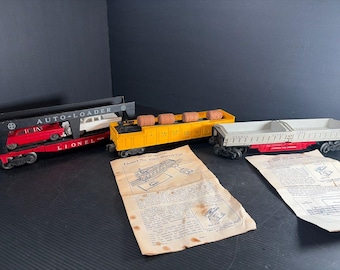 Postwar Lionel 6414 Auto Loader, 3359 Twin-Dump And 3562 Barrel Car No Boxes