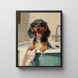 May include: A framed print of a dachshund dog in a bathtub. The dog has black and tan fur and is sticking its tongue out. The bathtub is teal, and a white towel hangs over the side. Bubbles float in the water.
