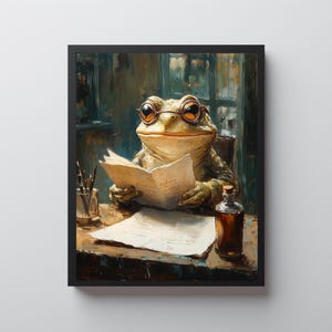 May include: A framed print featuring a whimsical illustration of a frog wearing spectacles, engrossed in reading a book at a desk. A bottle sits nearby. The artwork has a vintage, painterly style with muted colors.
