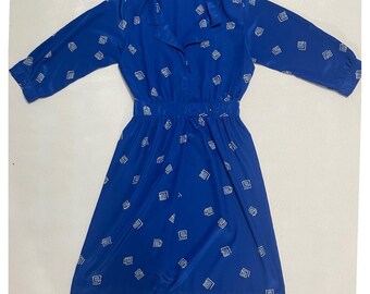 Peggy koningsblauwe midi-jurk met geometrische print en knoopsluiting aan de voorkant maat 8 P Vintage