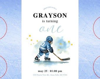 May include: A birthday invitation card featuring a watercolor illustration of a hockey player in a blue uniform with a stick. Text reads: please join us for a GRAYSON is turning one, may 25 | 01:00 pm, 1525 Prairie View Rd., Sioux Falls, SD 57104.