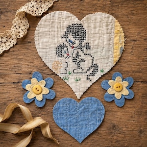 May include: A heart-shaped, quilted fabric with a cross-stitch design of a couple. Two blue flower-shaped appliqués with yellow centers and a blue heart-shaped appliqué are also present. A cream-colored lace ribbon and a gold ribbon are also visible.
