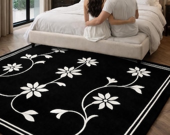Hand getufteter Wollteppich | Schwarz-weiße Blumenrebe, modernes Dekor