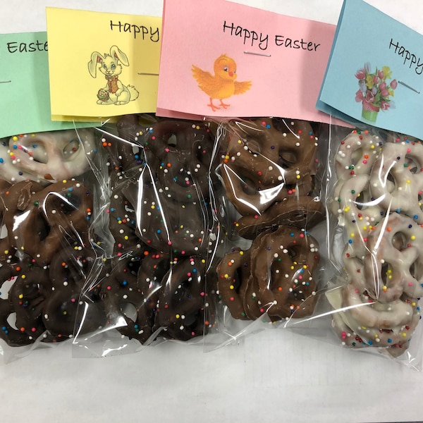 Easter treats chocolate covered  pretzels with pastel sprinkles