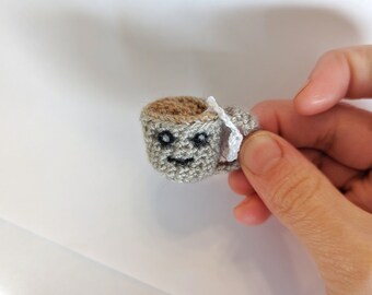 Small crochet grey tea cup
