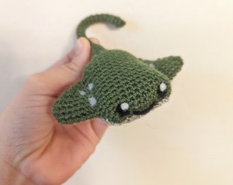 Small green and silver stingray doll