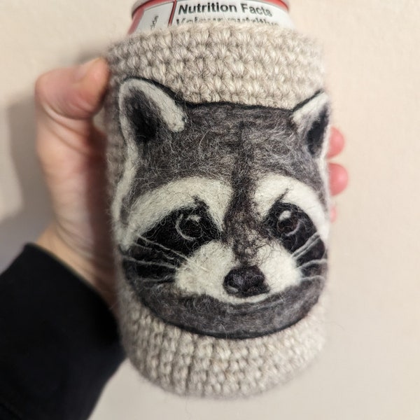 Felted raccoon can cozy