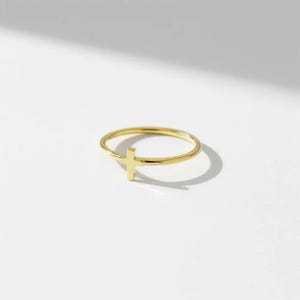 May include: A set of three ceramic vases in varying heights and shapes. The vases are glazed in a matte white finish, offering a minimalist aesthetic. The tallest vase is approximately 25 cm high.