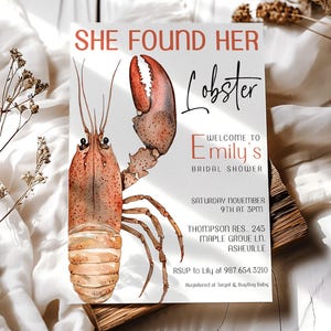 May include: A bridal shower invitation featuring a watercolour lobster illustration. The text says "She Found Her Lobster" and "Welcome to Emily's Bridal Shower". The invitation includes the date, time, and location details.