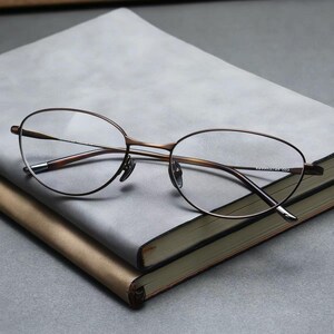 Gafas con bloqueo de luz azul, montura de titanio, gafas ovaladas de estilo vintage, montura óptica fina de titanio, gafas graduadas unisex.