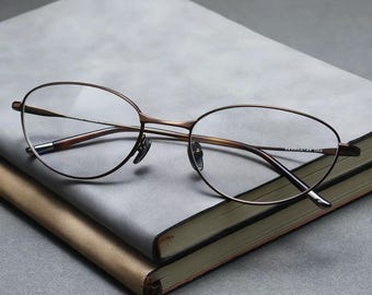 Gafas con bloqueo de luz azul, montura de titanio, gafas ovaladas de estilo vintage, montura óptica fina de titanio, gafas graduadas unisex.