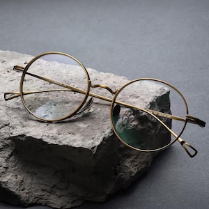 Occhiali da vista rotondi retrò in titanio, montatura vintage dorata, occhiali unisex retrò leggeri, montatura giapponese