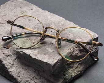 Vintage ronde titanium bril, lichtgewicht retro optisch montuur, gouden designerbril