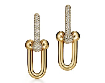 Pendientes de oro rosa de 18 quilates con diamantes de moissanita cultivados en laboratorio: Joyería fina que marca la diferencia.