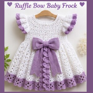 May include: A white and lavender crochet baby frock featuring a large lavender bow at the centre, ruffled sleeves with lavender trim, and a scalloped lavender hem. The text Ruffle Bow Baby Frock is displayed at the top with two purple hearts.