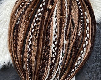 Viking style dreadlocks in natural brown shades.