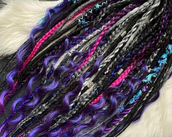 Dreads in black and purple shades. Festival style.
