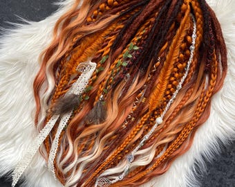 Copper-red dreadlocks for hair extensions.