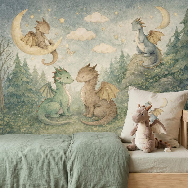 May include: A whimsical nursery scene featuring watercolor illustrations of dragons, moons, and stars. The artwork includes a plush dragon toy and a decorative pillow, creating a dreamy, fantasy-themed environment. The color palette is soft, with greens, browns, and blues.