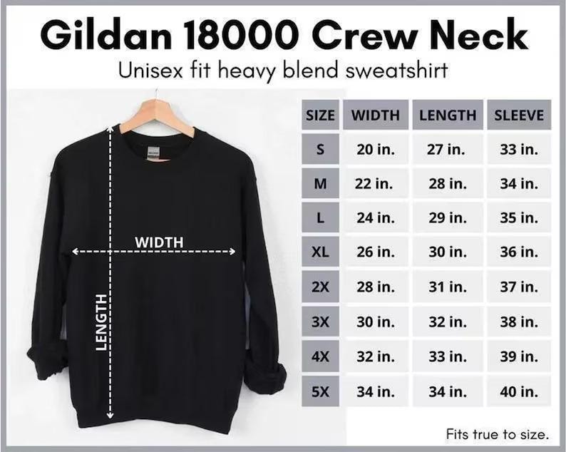 a black crew neck T-shirt with measurements and sizes listed below it.
