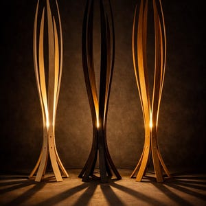 May include: Three contemporary wooden floor lamps with a distinctive, elongated form. Each lamp has vertical wooden slats that curve upwards, forming an open, organic shape. The lamps are illuminated internally, casting warm light and long shadows against a dark backdrop.