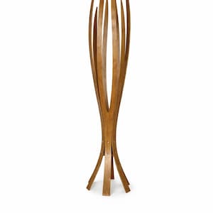May include: A tall, wooden coat stand with a distinctive design. It features multiple curved wooden slats that extend upwards, creating a decorative and functional piece. The natural wood finish adds warmth and style to any room.
