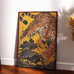 May include: A rectangular framed wall art print featuring a dynamic illustration of a warrior in dark robes wielding a sword against a large, pouncing tiger. The background is a vibrant yellow, contrasting with the dark figure and the tiger's orange and black striped fur.