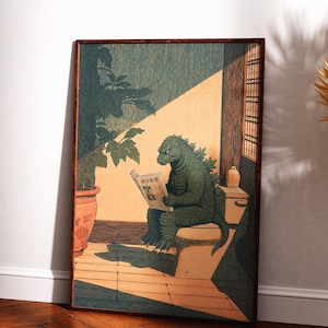May include: A framed art print depicting a green, reptilian creature sitting on a toilet whilst reading a newspaper titled Asahi Shimbun. The scene includes a potted plant, a wooden wall with a lattice window, and a small ceramic jar on the tank.
