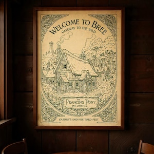 May include: A framed vintage print featuring the text "WELCOME TO BREE GATEWAY TO THE WILD". The illustration shows a cottage with a thatched roof, labeled "The Prancing Pony". The artwork is in a wooden frame, displayed on a wood-panelled wall.
