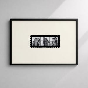 May include: A black framed photo collage featuring three black and white images of people. The collage has a scalloped edge and is set against an off-white background. The frame is rectangular.