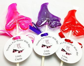 May include: Three roller skate shaped lollipops with white tags that say "Thanks For Rollin' With Me! Love, Caylie". The lollipops are pink, purple, and red.