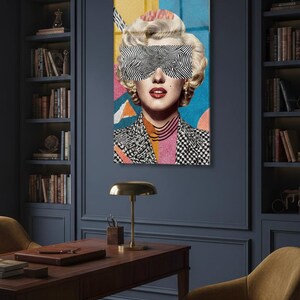 May include: A vertical glass wall art featuring a retro blonde woman portrait with black-and-white zebra pattern sunglasses, red lips, and a colorful geometric background.