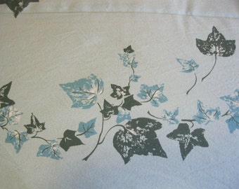 Beautiful cotton & rayon tablecloth in aqua blue with an ivy design