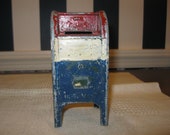 Cast iron bank in the shape of a USPS collection box