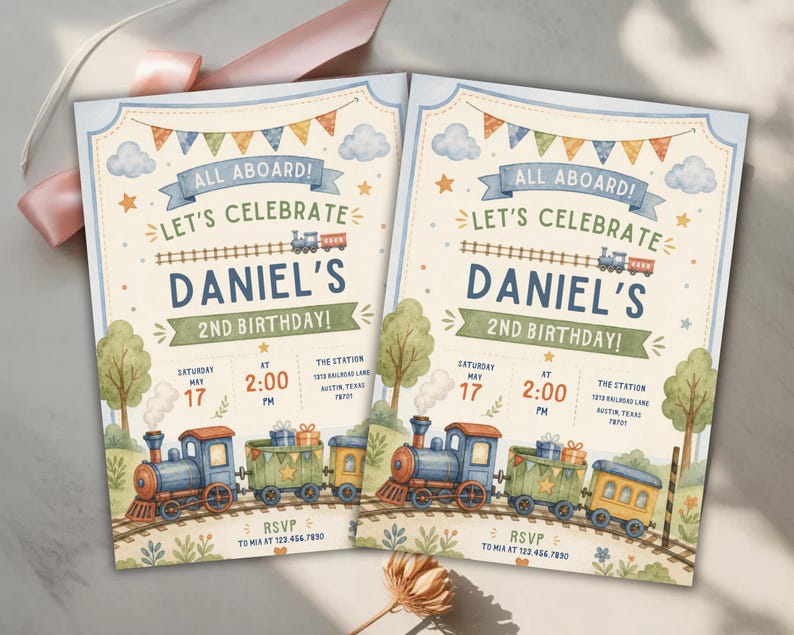 May include: Two identical birthday invitation cards featuring a watercolor train theme. The text reads ALL ABOARD! LET'S CELEBRATE DANIEL'S 2ND BIRTHDAY! with event details including Saturday May 17 at 2:00 PM at The Station, 1213 Railroad Lane, Austin, Texas.
