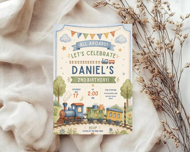 May include: A rectangular birthday invitation card featuring a watercolor train theme. The text reads: ALL ABOARD! LET'S CELEBRATE DANIEL'S 2ND BIRTHDAY! SATURDAY MAY 17 AT 2:00 PM THE STATION 1213 RAILROAD LANE AUSTIN, TEXAS 78731 RSVP TO MIA AT 123.456.7890.
