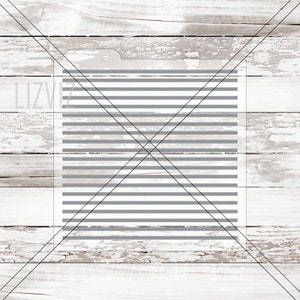 May include: A white wood background with a gray and white striped rectangle in the center. The rectangle is divided by a black diagonal line.