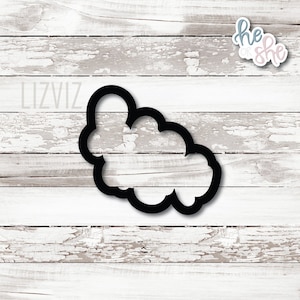 May include: Black metal cookie cutter shaped like a cloud.