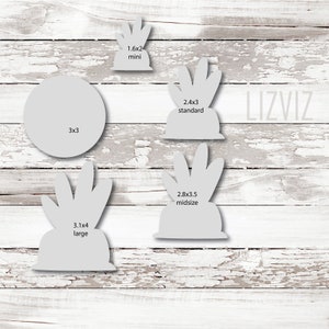 May include: Four different sizes of a succulent plant cookie cutter. The sizes are 1.6x2 inches mini, 2.4x3 inches standard, 2.8x3.5 inches midsize, and 3.1x4 inches large. The cookie cutters are on a white wooden background.