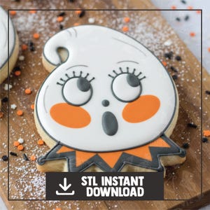 May include: A Halloween-themed sugar cookie shaped like a surprised ghost with a white base, orange cheeks, and gray accents. The cookie has a black outline and is decorated with a surprised expression. The image includes the text "STL INSTANT DOWNLOAD".