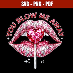 May include: A graphic design on a black background features a pair of lips encrusted with pink and clear crystals. A heart-shaped lollipop with a pink gem is in the center. The text "YOU BLOW ME AWAY" is in red.