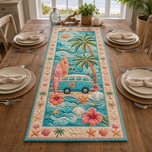 May include: A turquoise and blue quilted table runner with a beach theme. The design features palm trees, a vintage van, surfboards, seashells, and hibiscus flowers. The runner is bordered with a repeating pattern of palm trees and seashells.